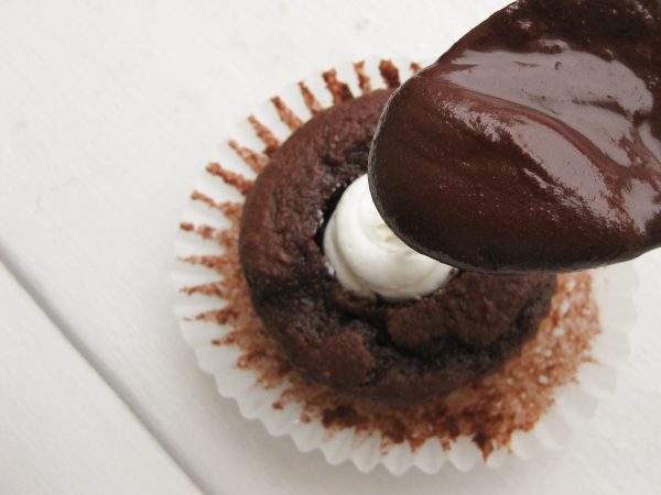 How to Make Homemade Hostess Cupcakes - chocolate cupcakes recipe with cream filling - get the recipe and step by step photo guide / tutorial to make this all-time favorite dessert!