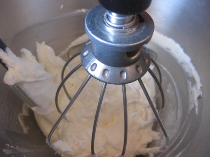 The Best Whipped Frosting Recipe! A fluffy vanilla frosting with a light whipped cream texture. It's less cloyingly sweet than other versions, too! 