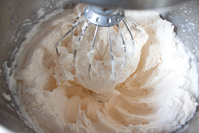 The Best Whipped Frosting Recipe! A fluffy vanilla frosting with a light whipped cream texture. It's less cloyingly sweet than other versions, too! 
