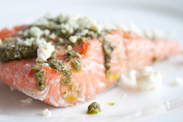 The Simplest Poached Salmon Recipe with Pesto and Feta - this salmon recipe makes the most tender, flakiest fish! 303 calories