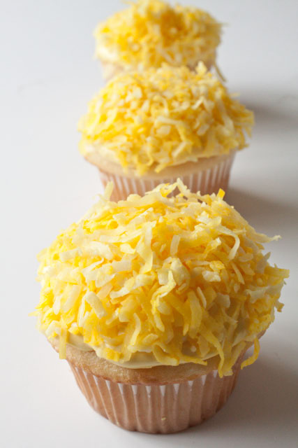 pile the cupcakes with coconut