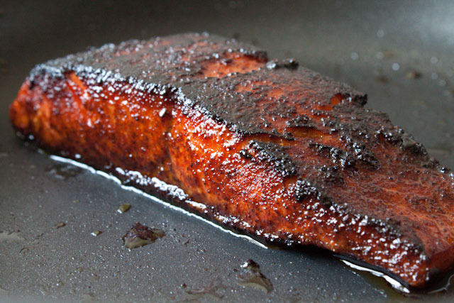 Brown Sugar Chili Rubbed Salmon Recipe - The brown sugar-chili rub gives the salmon a spicy-sweet-smoky flavor that gets blackened in the pan. It’s topped with a silky Avocado crema made with lime and garlic that you’ll want to slather on just about everything!
