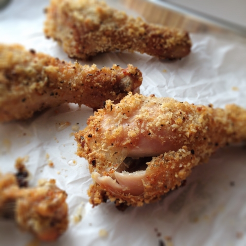 Buttermilk Oven "Fried" Chicken Recipe! This is the best, crispiest faux fried chicken - from the Skinnytaste Cookbook by Gina Homolka! Use chicken drumsticks and coat them in a homemade panko breadcrumb mixture, then bake them for the most tender "fried" chicken ever! 
