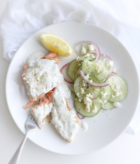 Salmon with Nonfat Yogurt Dill Sauce! Served with an easy cucumber feta salad. This meal is so bright and fresh--for 350 calories!