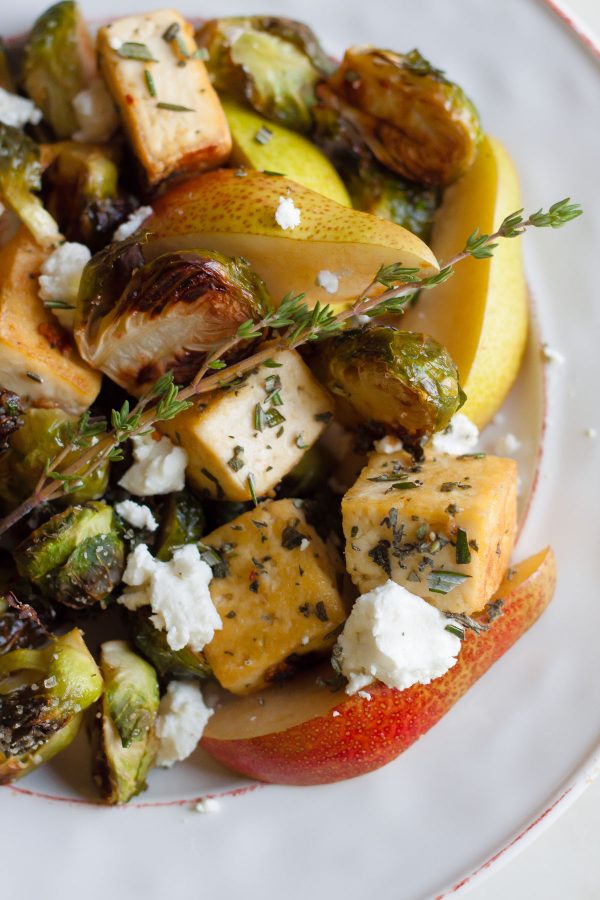 Rosemary Sage Tofu with Roasted Brussels Sprouts, Pear, and Goat Cheese - This healthy vegetarian salad recipe is perfect for fall and any holiday table!