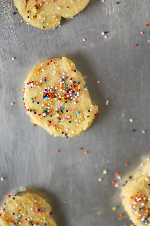 Easy Slice and Bake Sugar Cookie Recipe - these sugar cookies are so easy to make and only 77 calories each! Make the dough, form it into a log, wrap it in wax paper, and freeze - voila! Homemade slice and bake cookies!