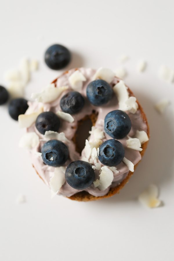 Blueberry Coconut Cream Cheese Topping - 5 Delicious and Light Bagel Toppings - here are 5 delicious bagel spreads you can make with no guilt at all! These toppings include flavors like funfetti, pizza, mediterranean, blueberry coconut, and even chocolate peanut butter banana! All have nutrition information!