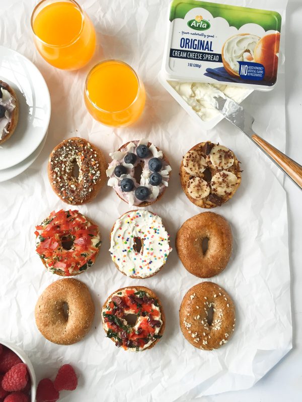 5 Delicious and Light Bagel Toppings - here are 5 delicious bagel spreads you can make with no guilt at all! These toppings include flavors like funfetti, pizza, mediterranean, blueberry coconut, and even chocolate peanut butter banana! All have nutrition information!