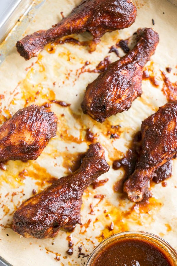 Chicken Drumsticks with Easy Homemade BBQ Sauce Recipe - In just 15 minutes of simmering, you’ll have an irresistible smoky, tangy, and sweet homemade BBQ sauce - made without ketchup, only canned tomato sauce, a little brown sugar, molasses, and spices - to slather on skinless chicken drumsticks! Serve them as an appetizer, game day snack, or entree.
