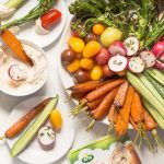 How to make a better vegetable platter with recipes for tandoori spice carrots, lemon broccolini, radishes, cucumbers, tomatoes - any seasonal veggies - and an easy cream cheese to dip!