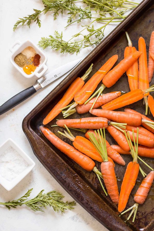 How to make a better vegetable platter with recipes for tandoori spice carrots, lemon broccolini, radishes, cucumbers, tomatoes - any seasonal veggies - and an easy cream cheese to dip! 