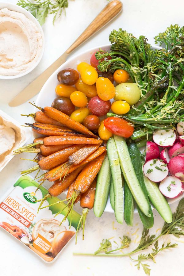 How to make a better vegetable platter with recipes for tandoori spice carrots, lemon broccolini, radishes, cucumbers, tomatoes - any seasonal veggies - and an easy cream cheese to dip! 