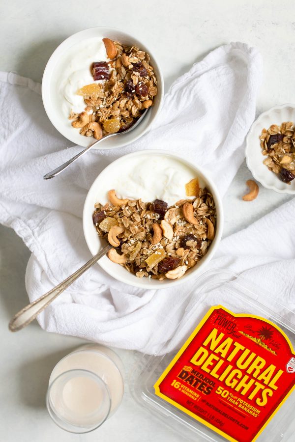 Cashew Ginger Granola with Medjool Dates and Sesame Seeds Recipe - a healthy whole grain granola recipe with cashews, medjool dates, crystallized ginger, sesame seeds, and the warm flavors of cinnamon, allspice and ginger. 295 calories per filling, delicious  serving