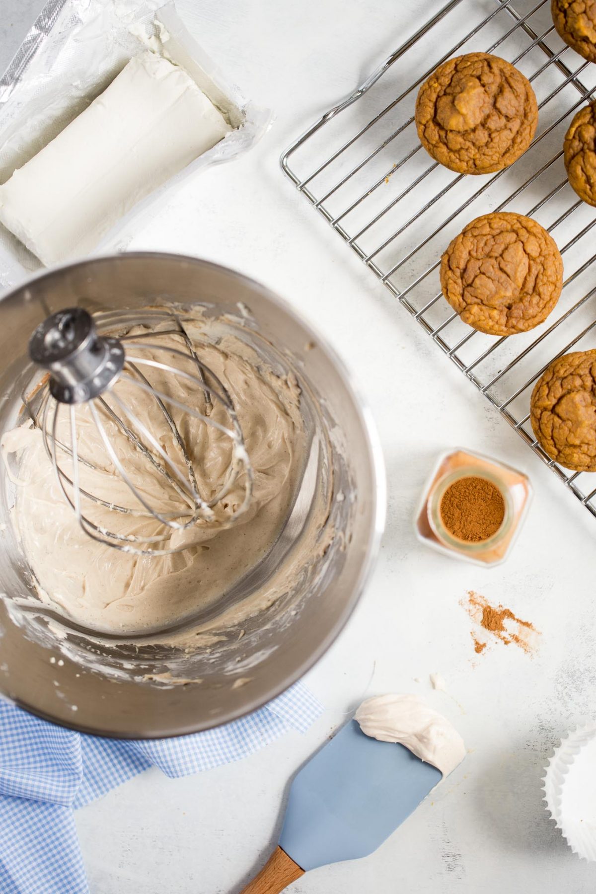Naturally Sweetened Pumpkin Cupcakes with Maple Cream Cheese Frosting - made with no refined sugar! These are naturally sweetened with medjool date paste!