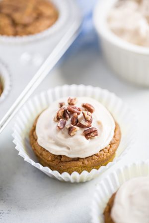 Pumpkin Spice Cupcakes with Maple Cream Cheese Frosting - made with no refined sugar! These are naturally sweetened with medjool date paste!