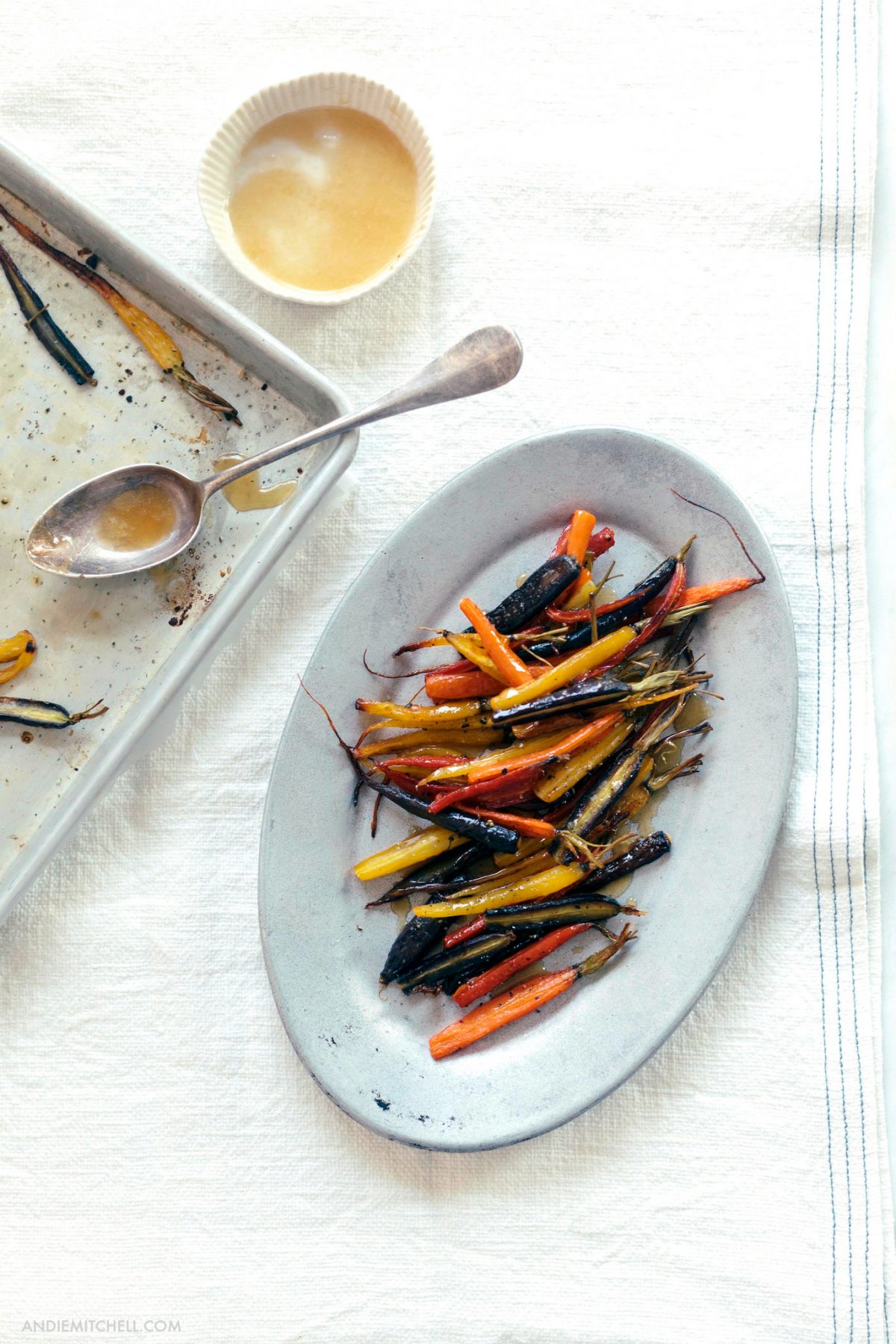 Roasted Carrots with Honey Butter - recipe from Eating in the Middle: A Mostly Wholesome Cookbook by Andie Mitchell. photo by Aran Goyoaga 