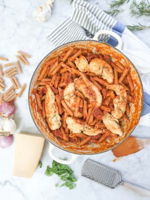 One Pan Rosemary Chicken with Penne and Vodka Sauce - this recipe is made all in one pan with whole wheat penne, broth, and a jar of DeLallo Creamy Vodka Sauce!