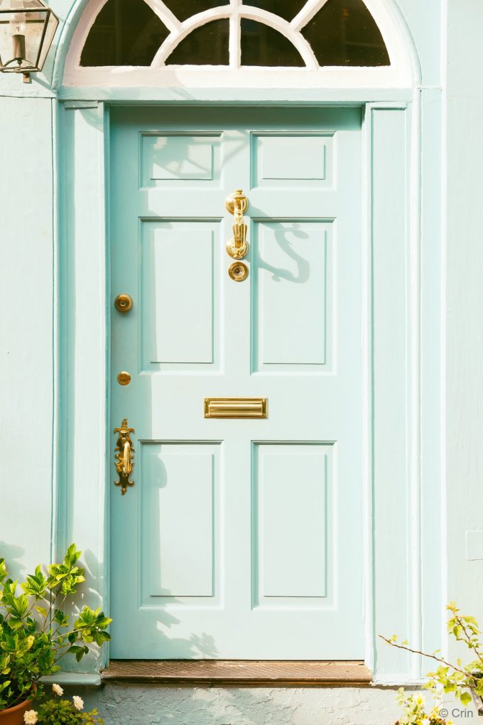 Mint Green Front Door with Gold Hardware - photo by Crin