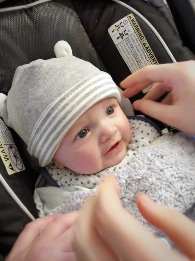 james bundled up in his carseat