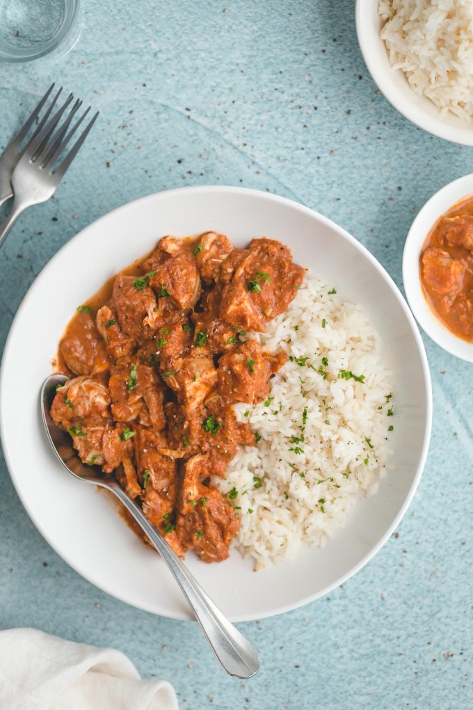 Slow Cooker Chicken Tikka Masala - all the big, bold flavor of the traditional dish, but it’s far easier—and lighter, too (263 calories or 3 Weight Watchers points). The chicken is fall-apart tender in a deliciously creamy, fragrant, slightly sweet, and subtlety tangy tomato sauce.
